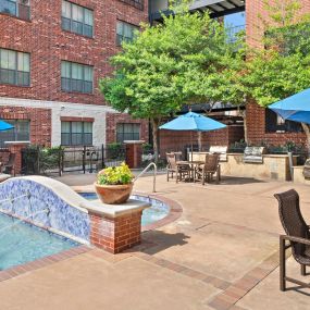 Third pool with BBQ grills and seating