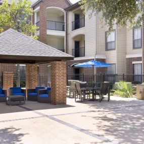 Pool 2 grills and cabana seating at Camden Farmers Market apartments in Dallas, TX