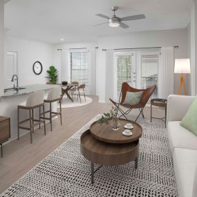 Townhome living room with wood-style floors at Camden Farmers Market in Dallas, Tx