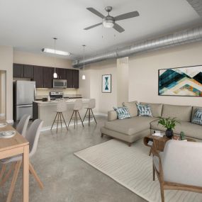 Loft-style living and dining room at Camden Farmers Market Apartments in Dallas, TX