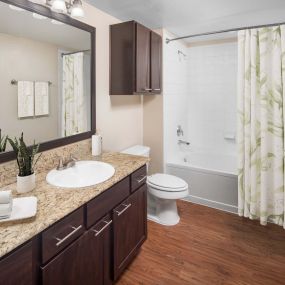 Modern-style bathroom with granite countertops at Camden Farmers Market in Dallas, Tx