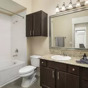 Loft-style bathroom at Camden Farmers Market Apartments in Dallas, TX