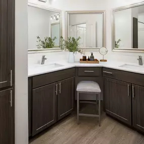 Primary bedroom with carpet and ensuite at Camden Farmers Market in Dallas, Tx