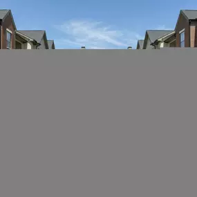 Aerial view of Pool 1 with the Dallas skyline in the background at Camden Farmers Market apartments in Dallas, TX