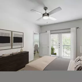 Contemporary-style bedroom with walk-in closet and ensuite at Camden Farmers Market Apartments in Dallas, TX