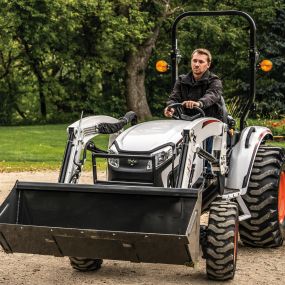 Bobcat CT2025 with front-end loader on gravel