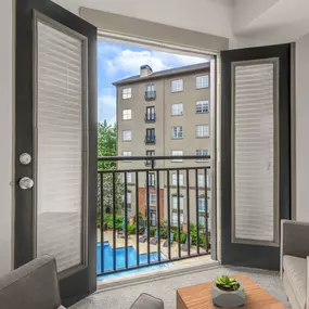 Juliette balcony with french doors overlooking the pool