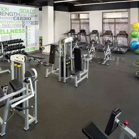 24-Hour Fitness Center with a wide array of cardio and strength training equipment