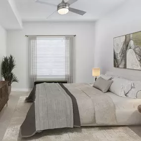 Modern bedroom with carpet and ceiling fan at Camden Midtown Atlanta in Atlanta, GA