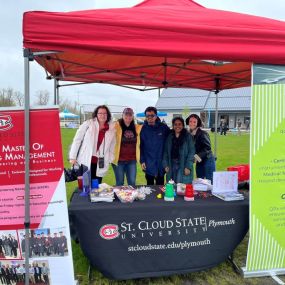 Cold morning, muddy, windy, with great attitudes it then turned to a great day of fun! We let lots of families know we are conveniently located in Plymouth and when they, or their children are ready, SCSU is there for St. Cloud State School of Graduate Studies!

We had fun engaging intergenerational activity with minute to win it games for great SCSU Plymouth swag.

Thank you to Camila, Smeet, Simeran and Linda for great fun.