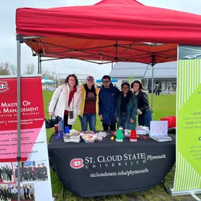 Cold morning, muddy, windy, with great attitudes it then turned to a great day of fun! We let lots of families know we are conveniently located in Plymouth and when they, or their children are ready, SCSU is there for St. Cloud State School of Graduate Studies!

We had fun engaging intergenerational activity with minute to win it games for great SCSU Plymouth swag.

Thank you to Camila, Smeet, Simeran and Linda for great fun.