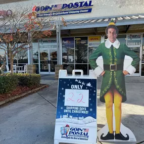 Elf says ‘Only 22 more shipping days until Christmas! Don’t wait until the last minute. Come to Goin' Postal of Jacksonville, NC for all your shipping, boxing, and mailing needs this holiday season.