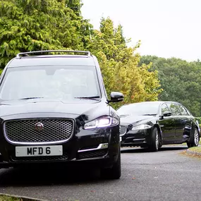Miles & Daughters Funeral Directors vehicles driving