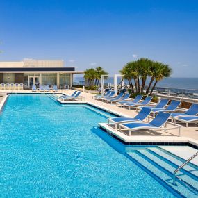 Rooftop pool overlooking Tampa Bay at Camden Pier District apartments in St. Petersburg, Florida.