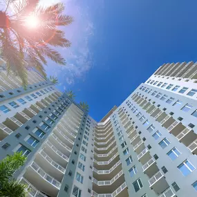 Looking up to the sky and building at Camden Pier District apartments in St. Petersburg, Florida.