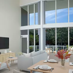 Townhome floor plan dining and living area with direct patio access