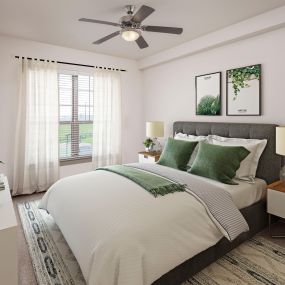 Spacious bedroom with carpet and ceiling fan