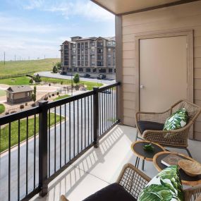 Spacious balcony overlooking the dog park