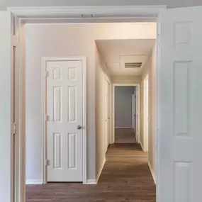 The hallway at Cierra Crest Apartments leads to the bedrooms, offering a smooth transition between spaces.