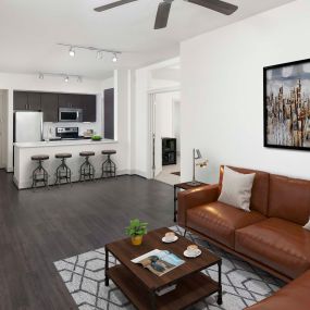 Living room and kitchen at Camden Boca Raton apartments in Boca Raton, FL