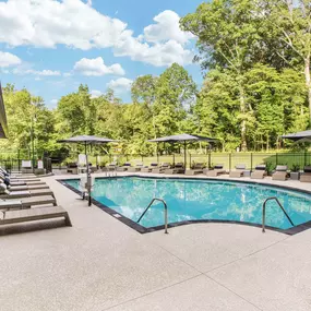 Pool with deck chairs