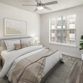 Bedroom with lighted ceiling fan at Camden Washingtonian apartments in Gaithersburg, MD