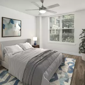 Bedrooms feature ceiling fans and wood-style flooring throughout at Camden Washingtonian apartments in Gaithersburg, MD