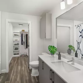 Spacious bathrooms with garden-style bathtubs and walk-in closets at Camden Washingtonian apartments in Gaithersburg, MD