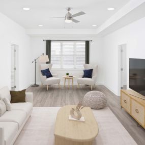 White contemporary apartment living room with reading nook at Camden Grandview in Charlotte, NC