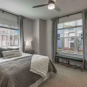 Townhome bedroom with two large windows