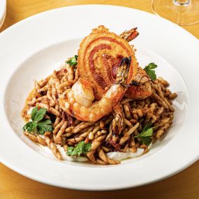 Fall 2022 Grilled Shrimp and Trofie Pasta  with Radicchio pesto, pancetta, red wine braised onions, whipped ricotta, toasted pine nuts
