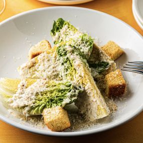 Caesar Salad with little gems, croutons, whole grain mustard dressing, grana padano