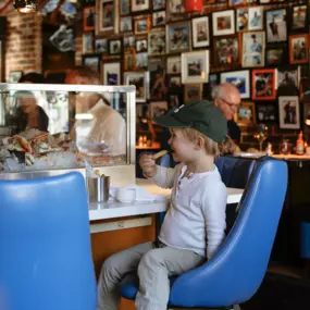 Kid eating fries