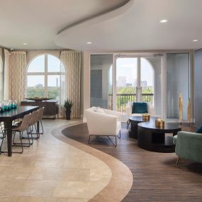 Sky lounge with indoor/outdoor space at Camden Highland Village apartments and townhomes in Houston, Texas