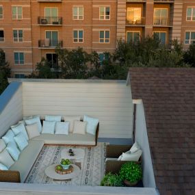 The townhomes rooftop terrace with dining and seating space
