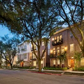 The townhomes building exterior at night