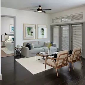 The terrace living room with wood flooring ceiling fan and access to a private balcony