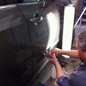 The most common practical use for Paintless Dent Repair (PDR) is the repair of hail damage, door dings, minor body creases, and minor bumper indentations. The techniques can also be applied to help prepare the damaged panel for paint. Let Fix Auto Collision help today!