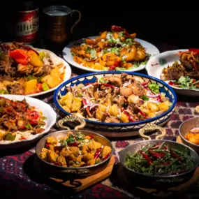 A group of Uyghur food on a table, Karamay, London