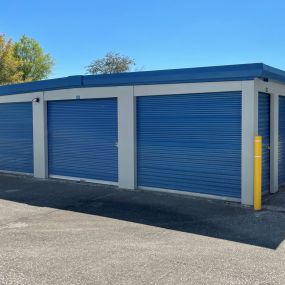 Row C view of our exterior blue drive up units at Fort Knox Self Storage Lady Lake