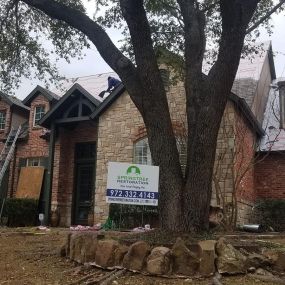 Springtree Restoration Roofing Team is in action on the work-in-progress project.