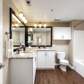 Bathroom with dual vanity dual sinks