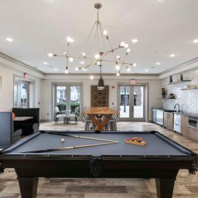 Resident lounge with pool table and entertaining kitchen