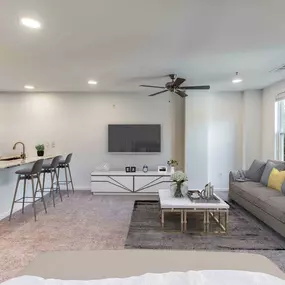 Kitchen and living room in studio apartment at Camden Monument Place apartments in Fairfax, VA