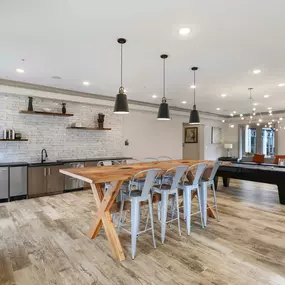 Resident lounge with entertaining kitchen at Camden Monument Place apartments in Fairfax, VA