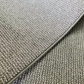 Machine serging a custom stair runner.