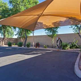 Covered car care center with hose and dryer