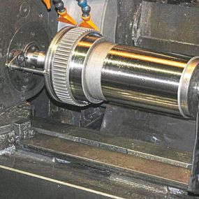 CNC Grinding of a Steel Splined Shaft for Heavy Equipment