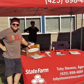 Agent Toby Stevens hanging out at his booth