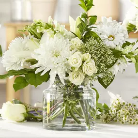 Classic Ivory – A Florist Original! Send a gorgeous white flower bouquet - a fresh, pure white flower vase arrangement. Order flowers online for same day delivery in Corry